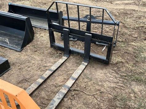 tomahawk skid steer forks